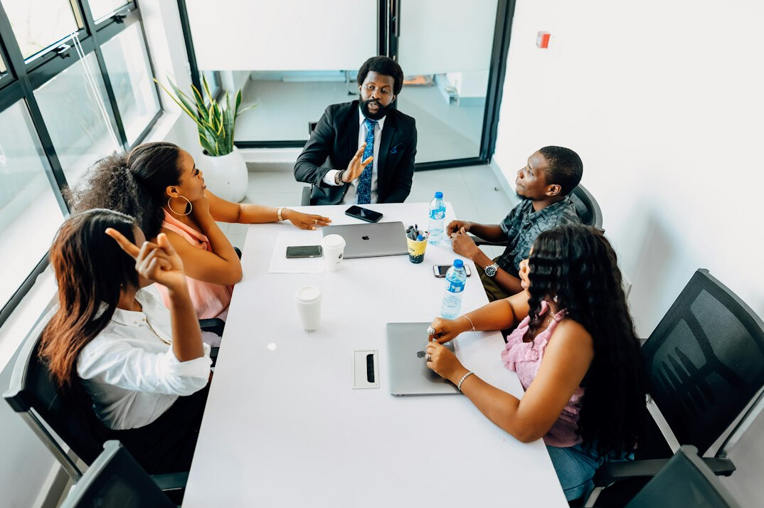 business people negotiating in meeting room